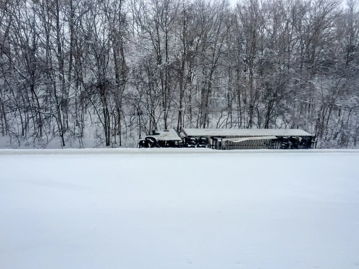 18-wheeler that slid off the road in a snowstorm