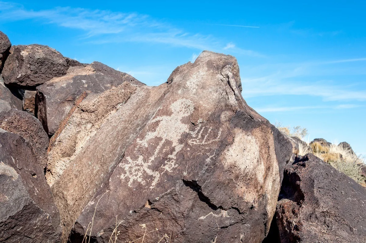 Drawing of a person on a rock