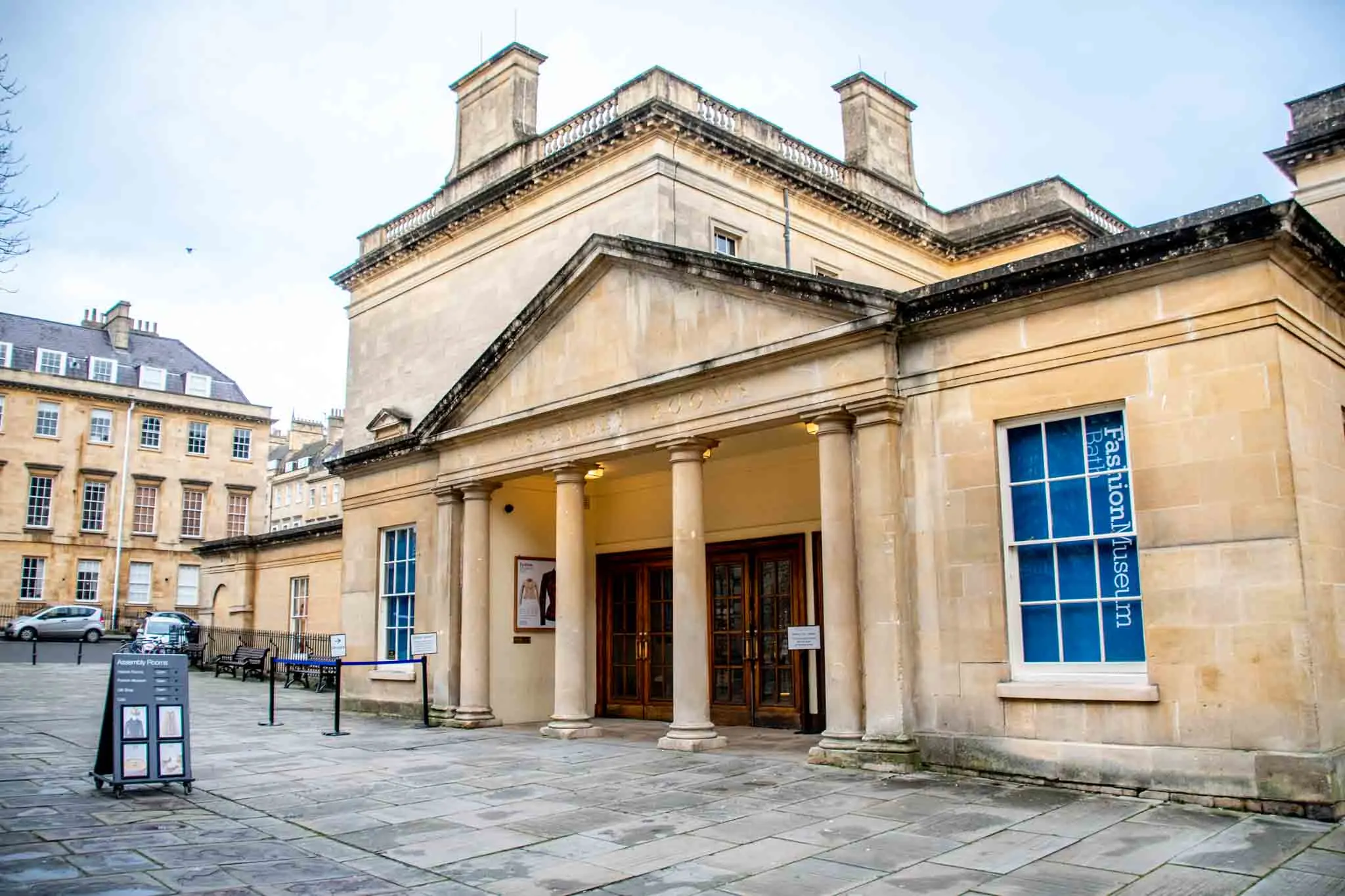 Yellow exterior of the Bath Assembly Rooms, the home of the Fashion Museum
