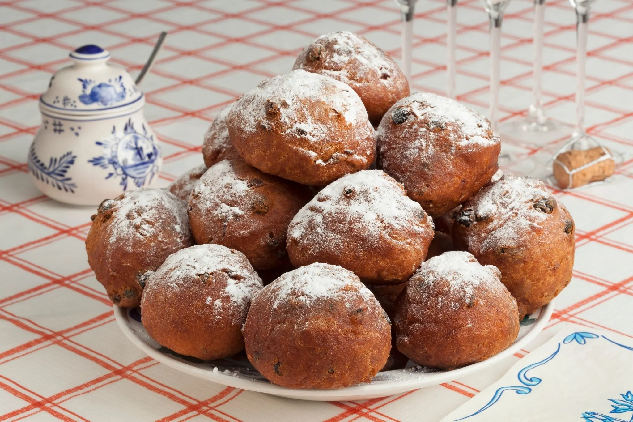Fried dough balls topped with powdered sugar