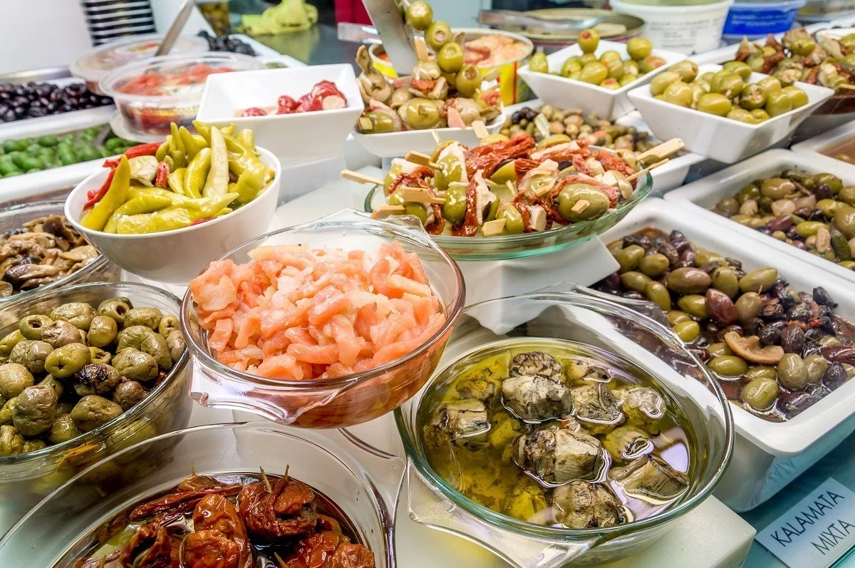 Olives and pickles at the Abaceria Central market in Barcelona, Spain