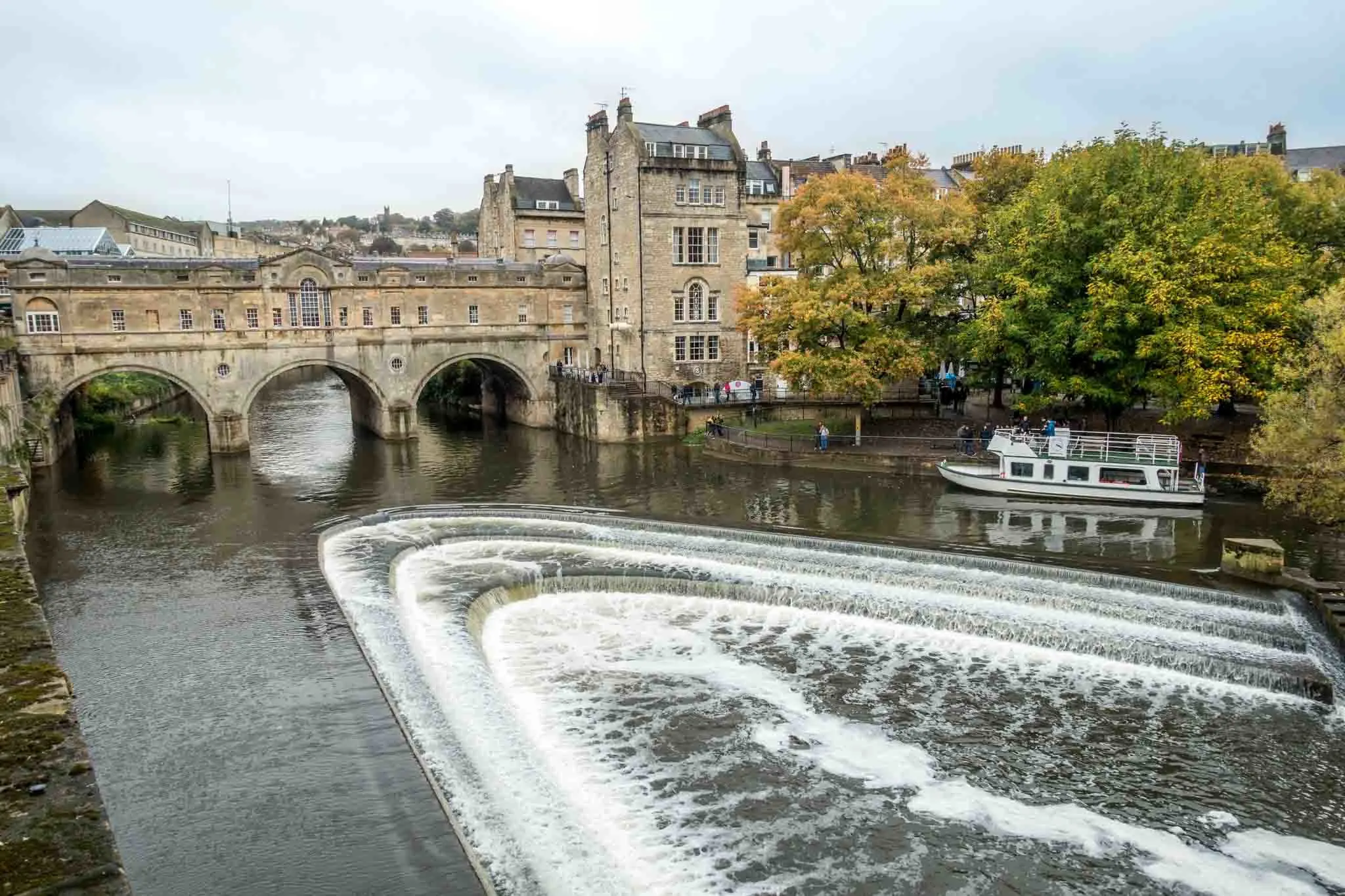 Large stone bridge over the rushing River Avon.