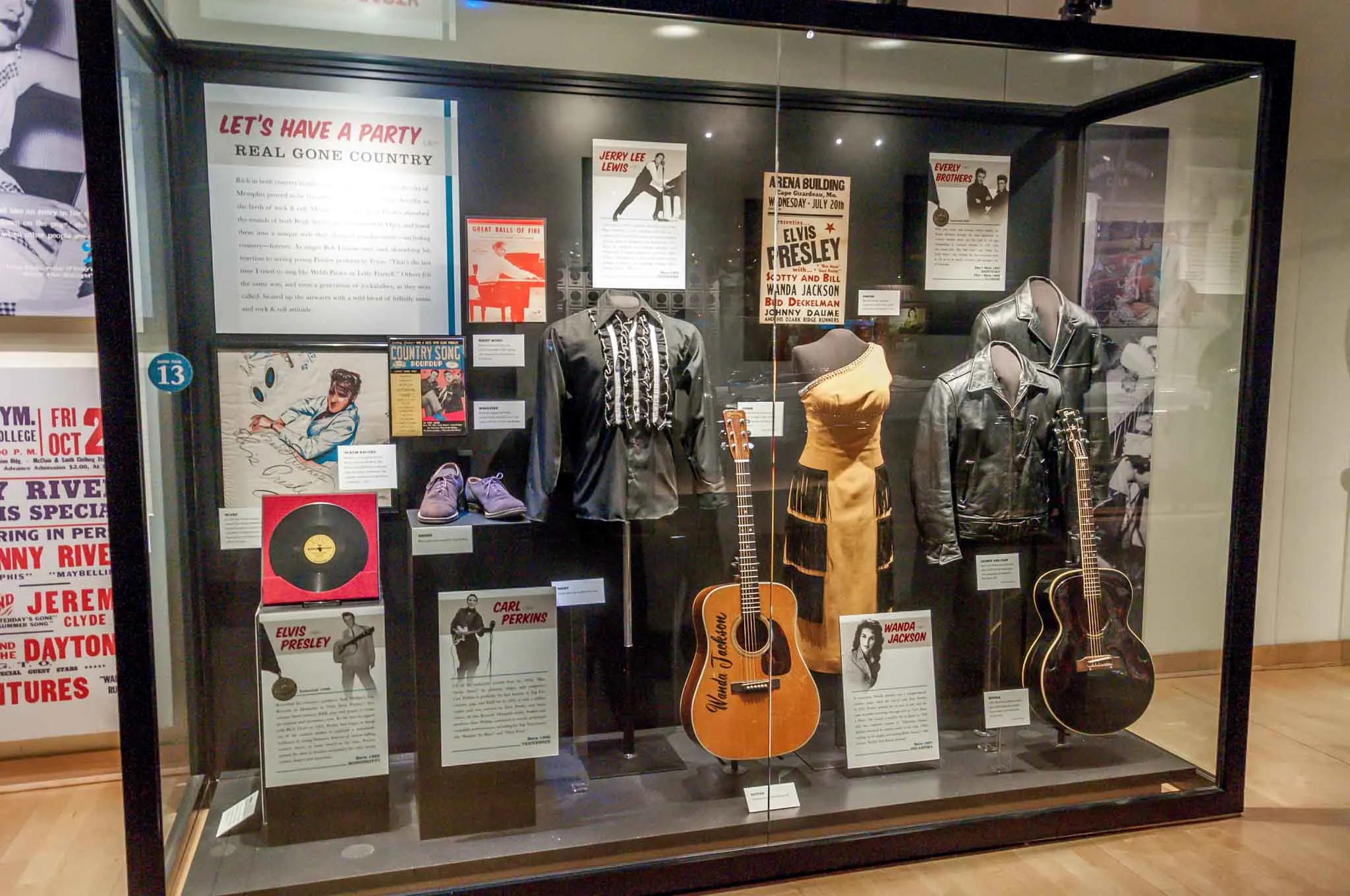 Clothes and instruments on display at the Country Music Hall of Fame.