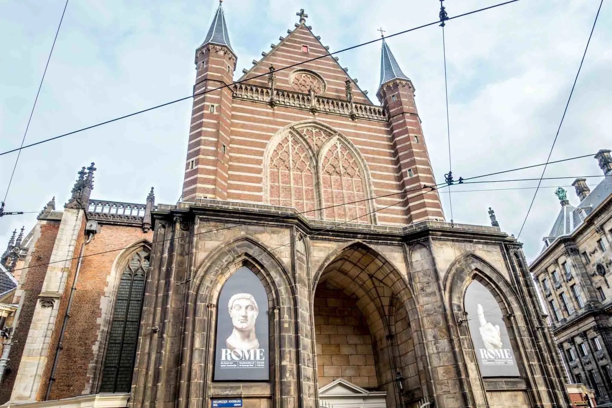 Church with posters advertising an exhibit inside