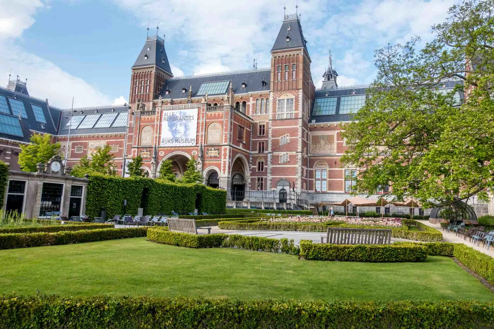 Large brick building with gardens , the Rijksmuseum