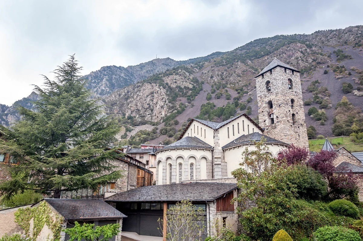 The church in Andorra la Vella with the Pyrenees Mountains towering above