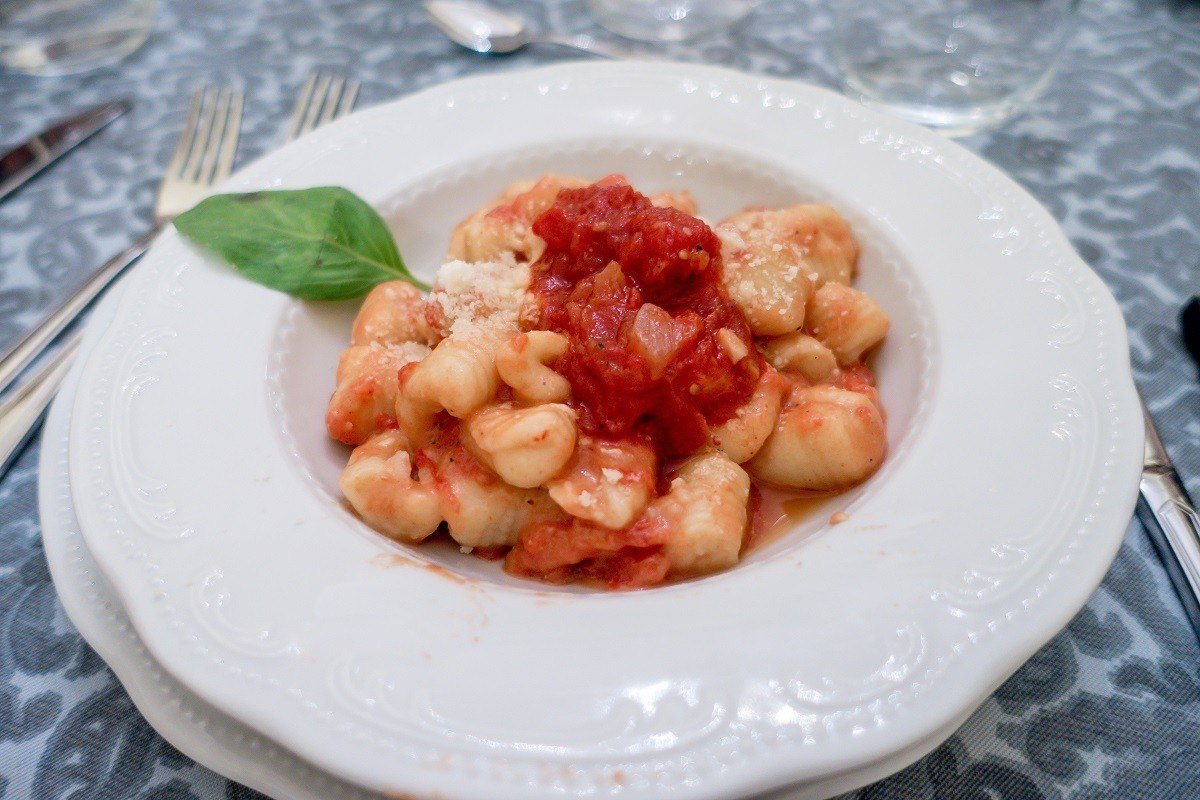 Gnocchi topped with tomato sauce