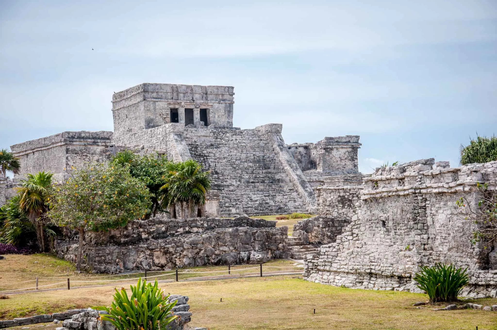 Ancient ruins of stone buildings and trees