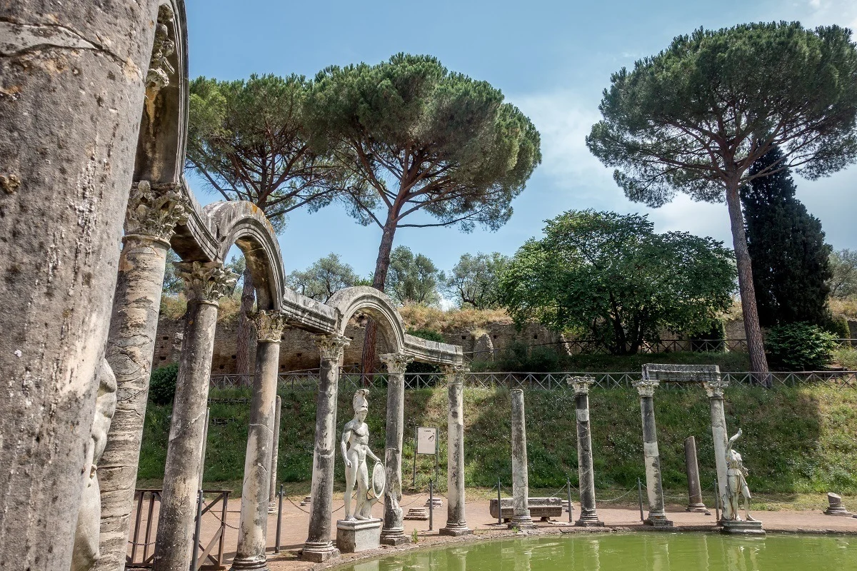 Statue and arches by the Canopus pool of Hadrian's Villa in Tivoli Italy