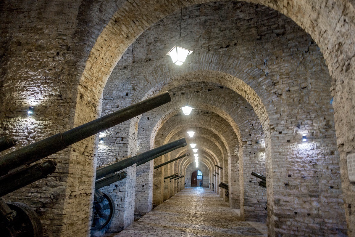 Tunnel lined with cannons at the entrance to the military museum