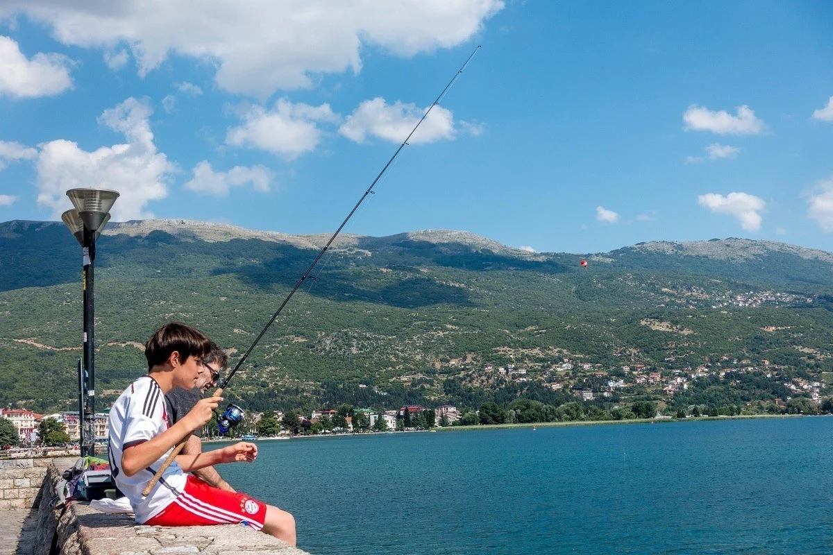 People fishing from the promenade in Ohrid