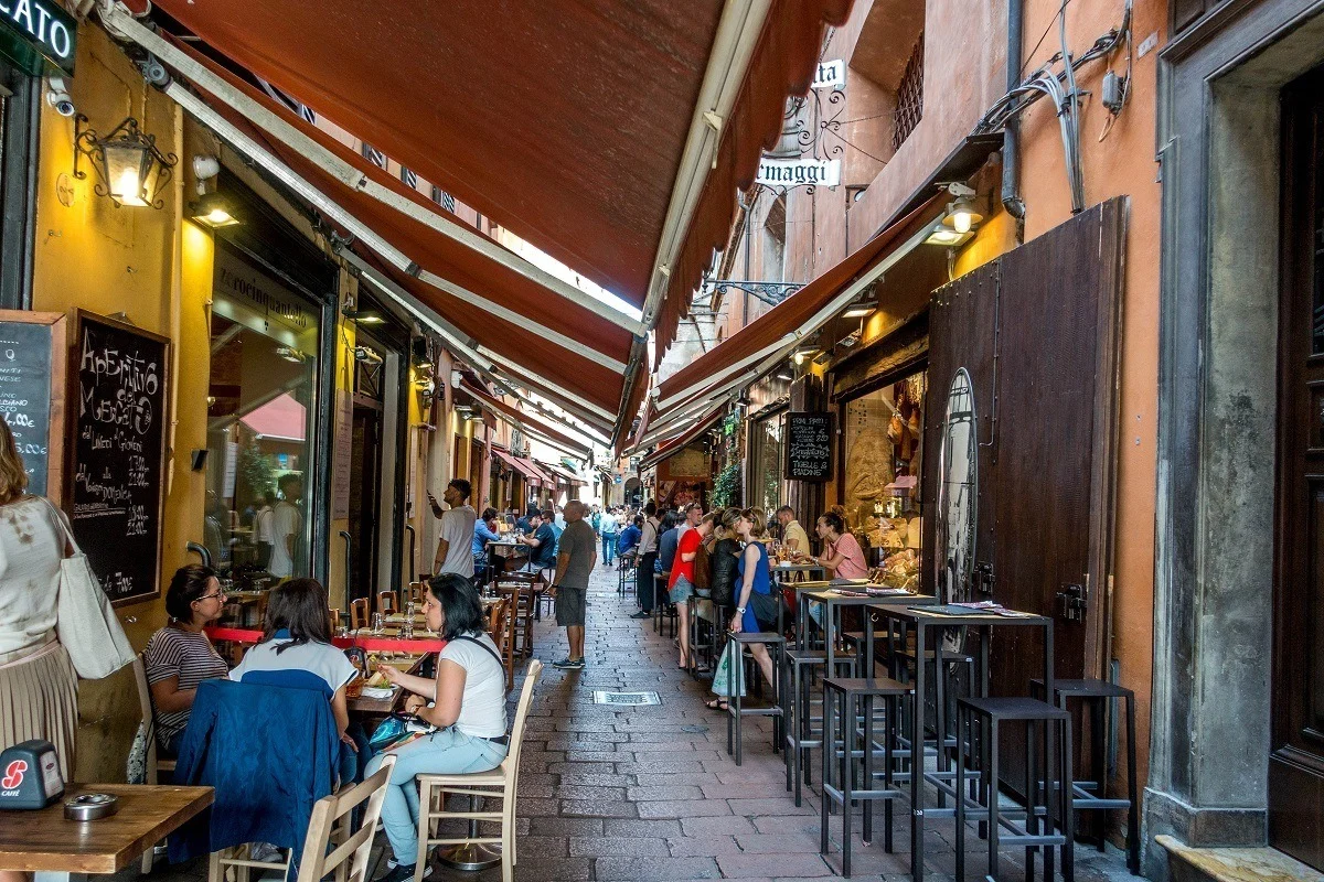 Visiting outdoor cafes is one of the fun things to do in Bologna Italy