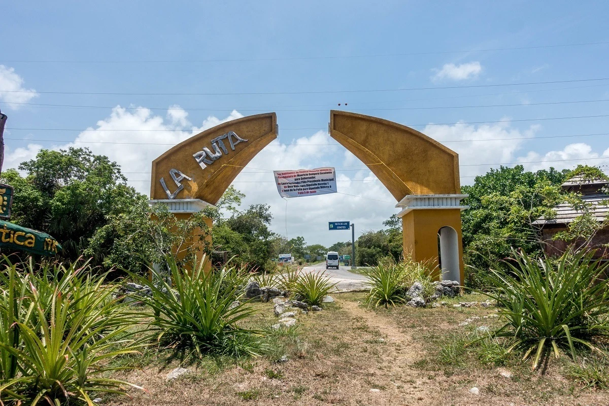The dilapidated Ruta de los Cenotes sign in Puerto Morelos