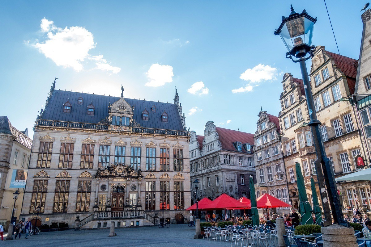 Historic buildings and outdoor cafe in market square in Bremen, Germany