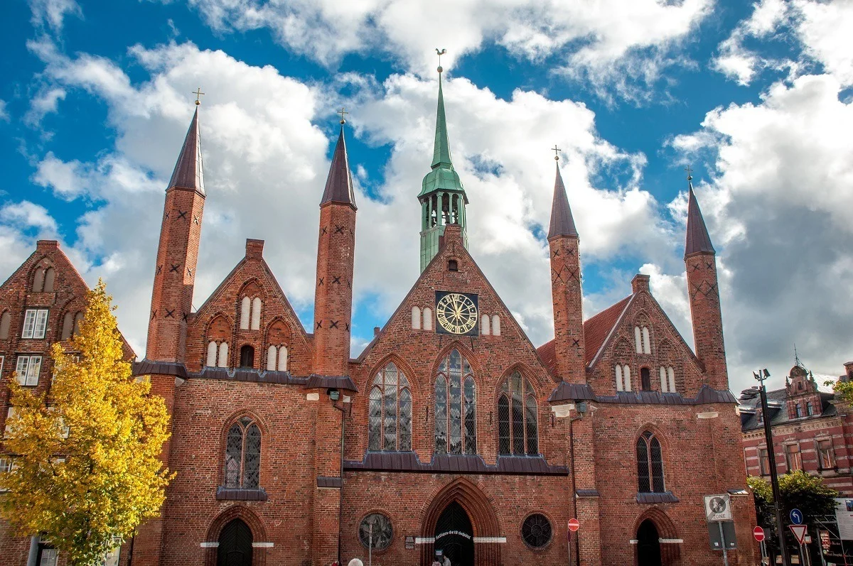 Medieval building with spires and clock, Lubeck's Hospital of the Holy Spirit 