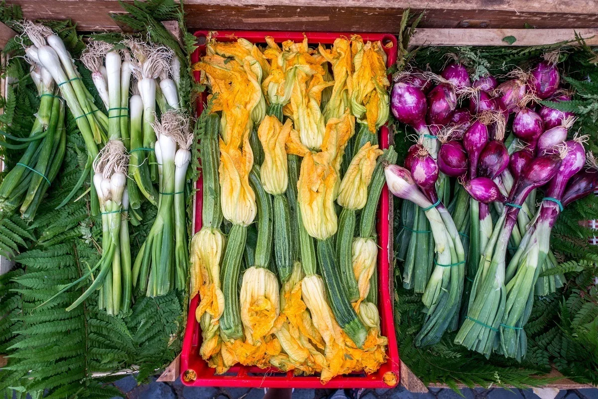 Some of the beautiful summer vegetables for sale at the Campo de Fiori market in Rome, Italy