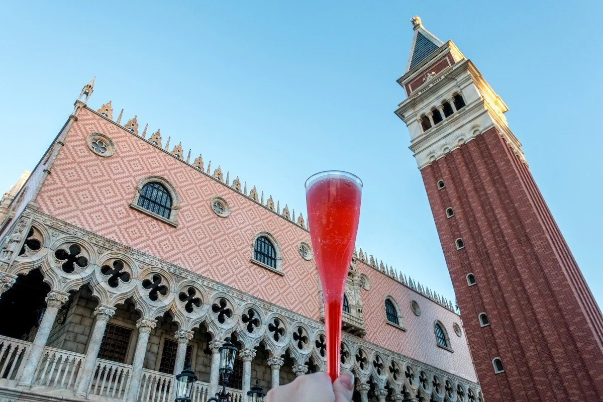 Cocktail in front of Italy pavilion and tower at Epcot