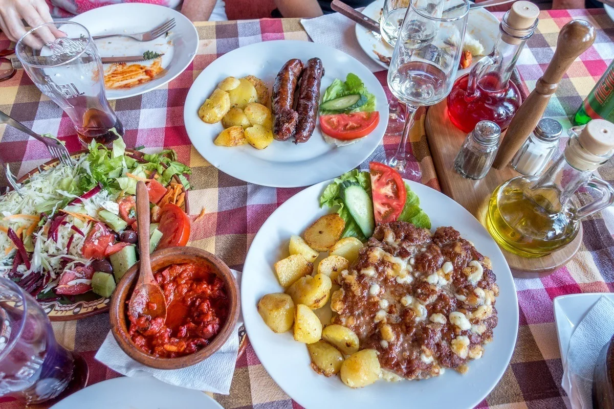 Salad, potatoes, sausages, and traditional food