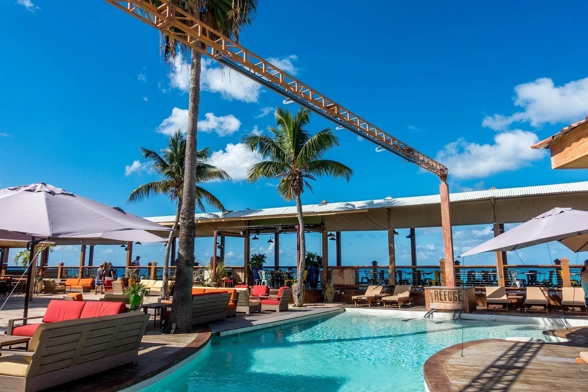 Pool and chairs on a deck