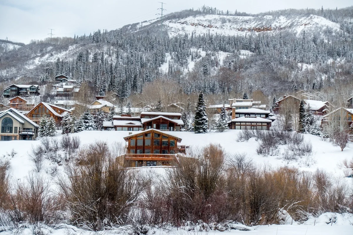 Vacation rental homes on the side of the snowy mountain