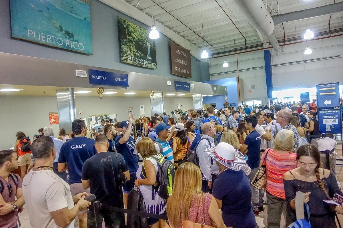 Long lines of people at the cruise ship embarkation terminal in San Juan, Puerto Rico