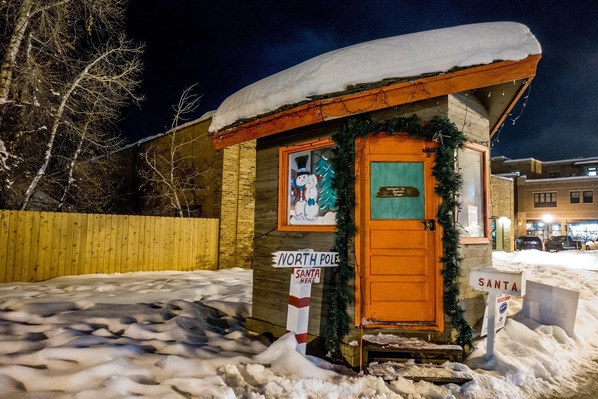 A hug for visiting Santa Claus in downtown Steamboat Springs Colorado