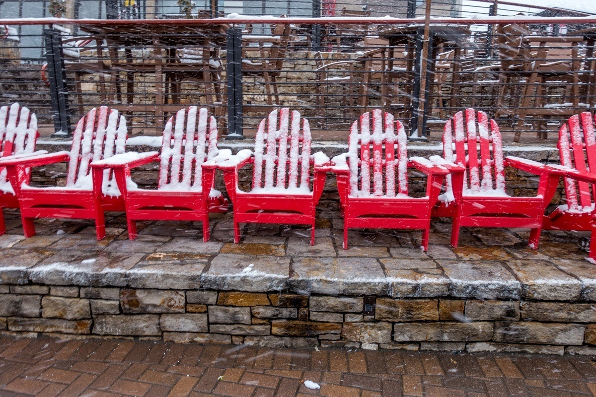 Colorful red chairs in Gondola Square at Steamboat Resort