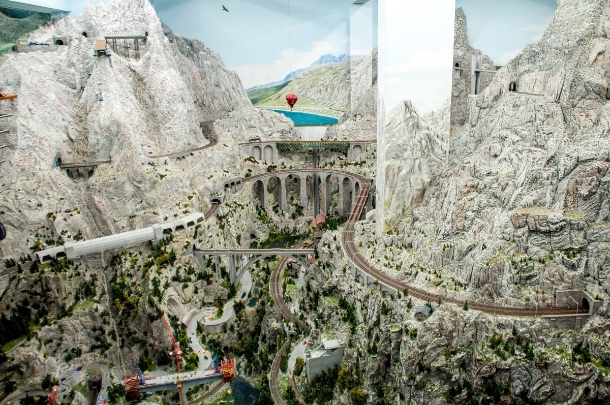 A model train in the mimicking the Swiss Alps