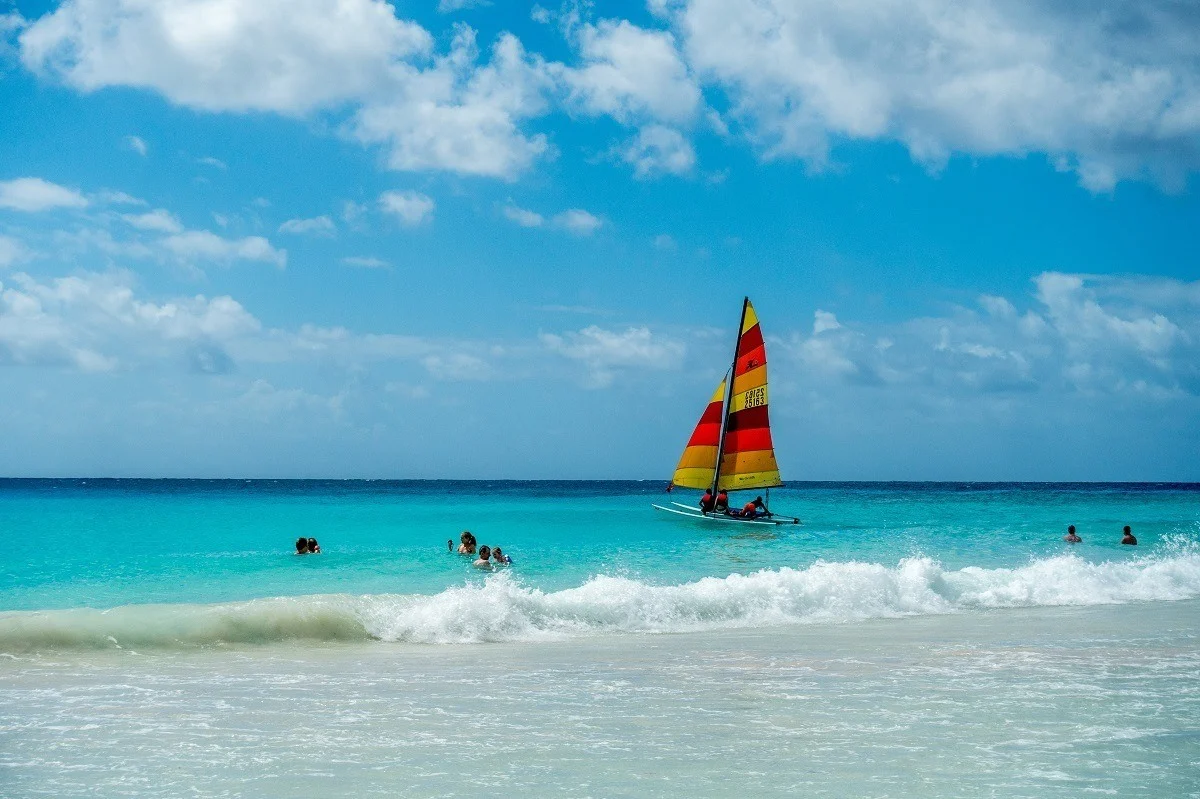 People swimming and sailing in Barbados