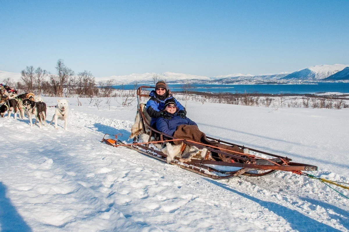 Two people in a dog sled in Norway.