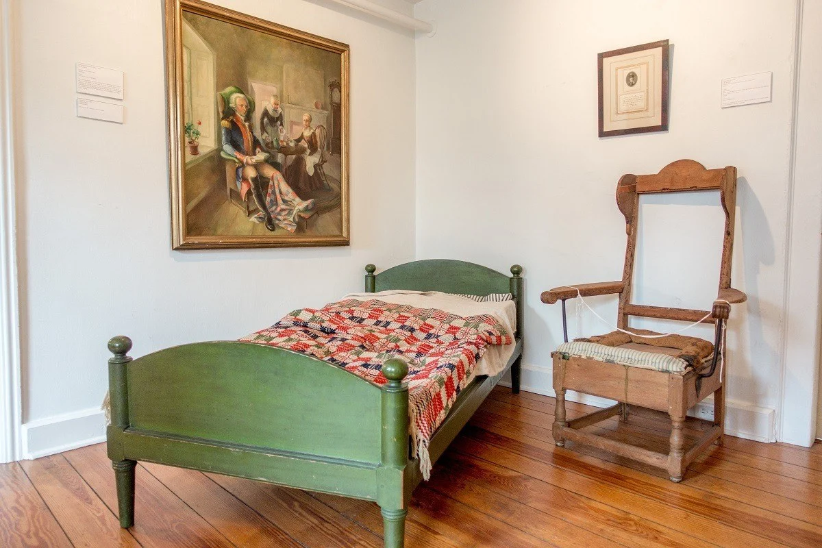 Bed and chair on display at the Moravian Museum