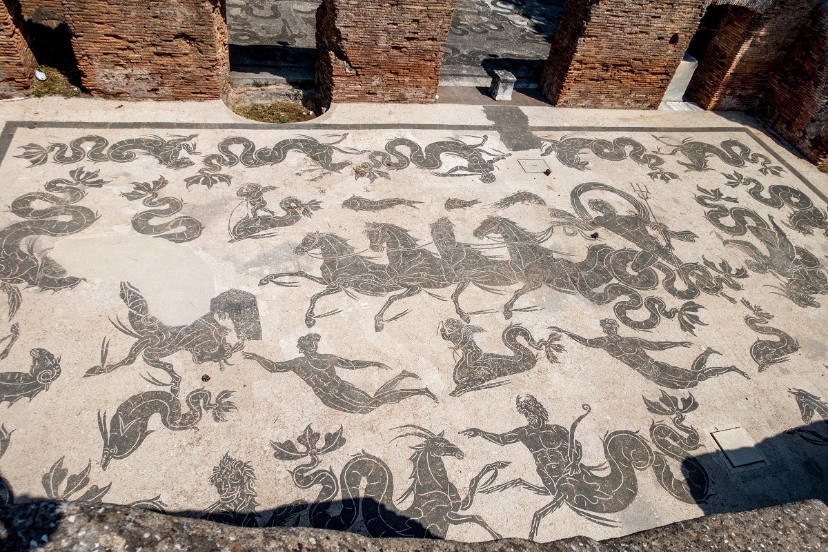 Mosaic with black horses and gods at the Baths of Neptune in Ostia Antica, Italy