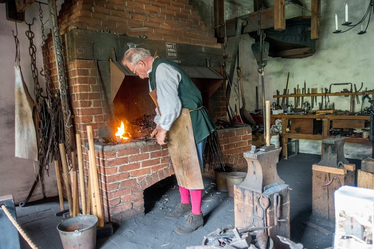 Blacksmith at the forge at the Smithy in Bethlehem PA