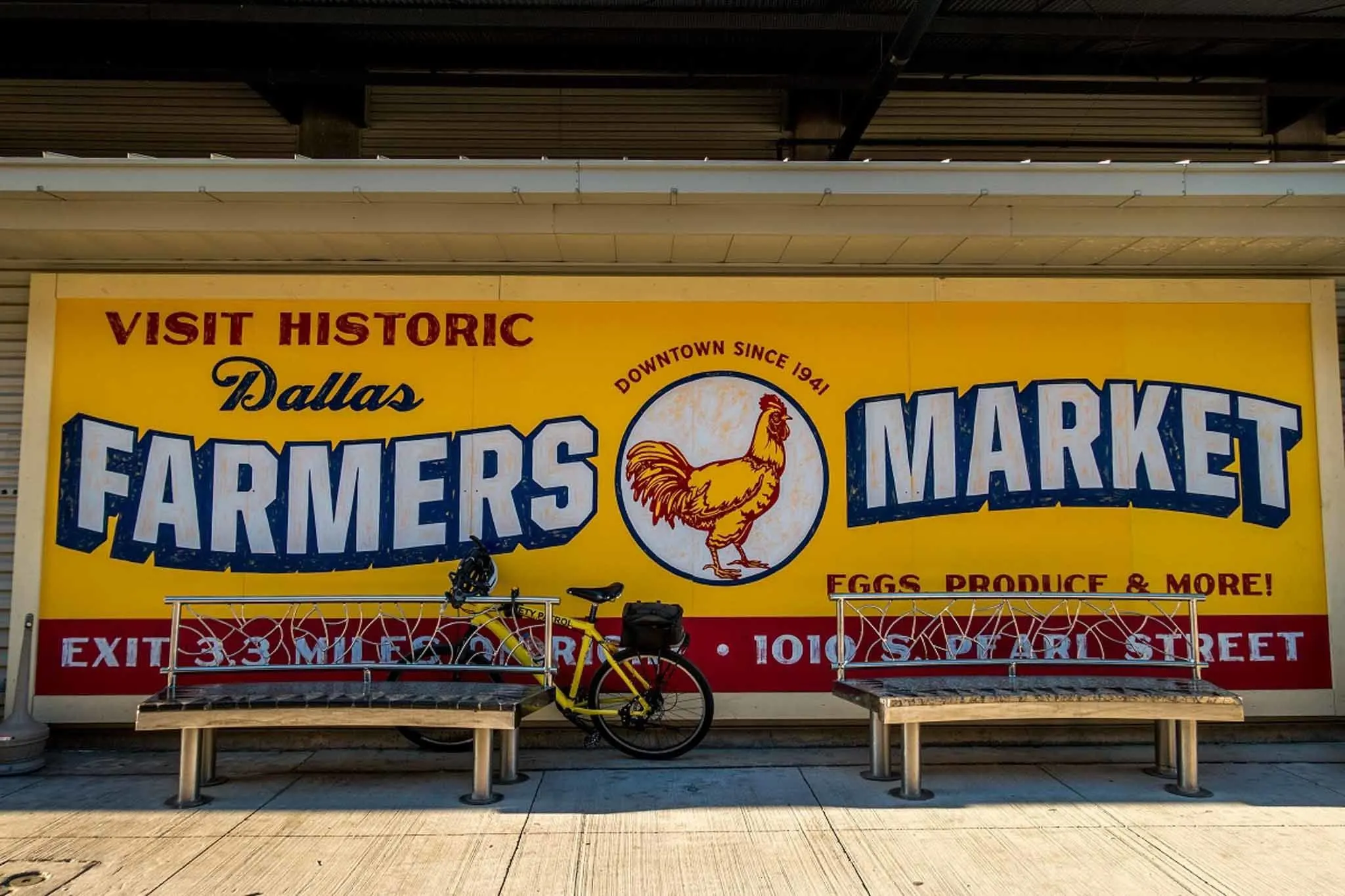 Yellow sign: Visit Historic Dallas Farmers Market