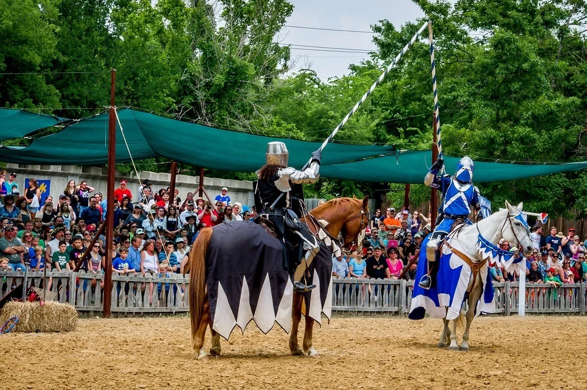Knights jousting on horseback at Scarborough Renaissance Festival near Dallas, Texas