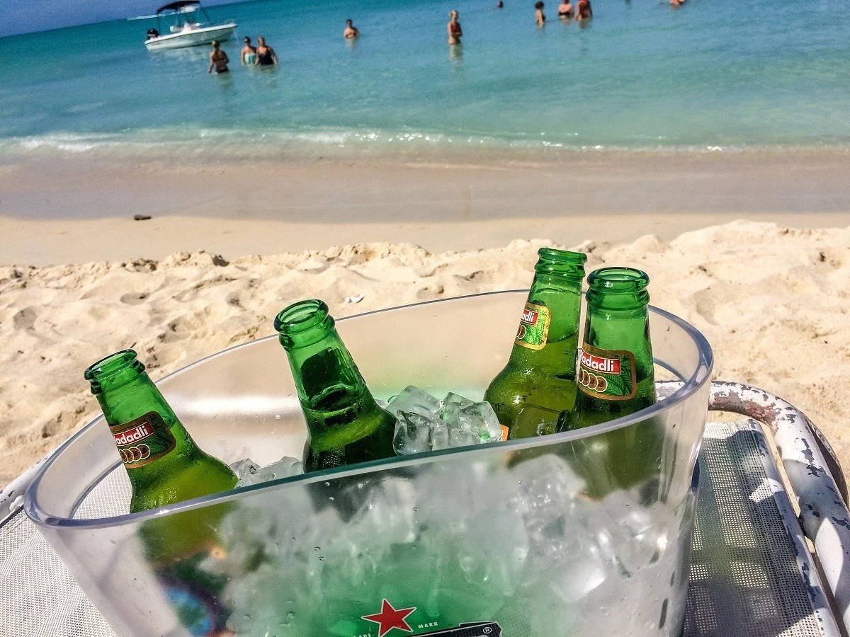 A bucket of Wadadli beer on the beach