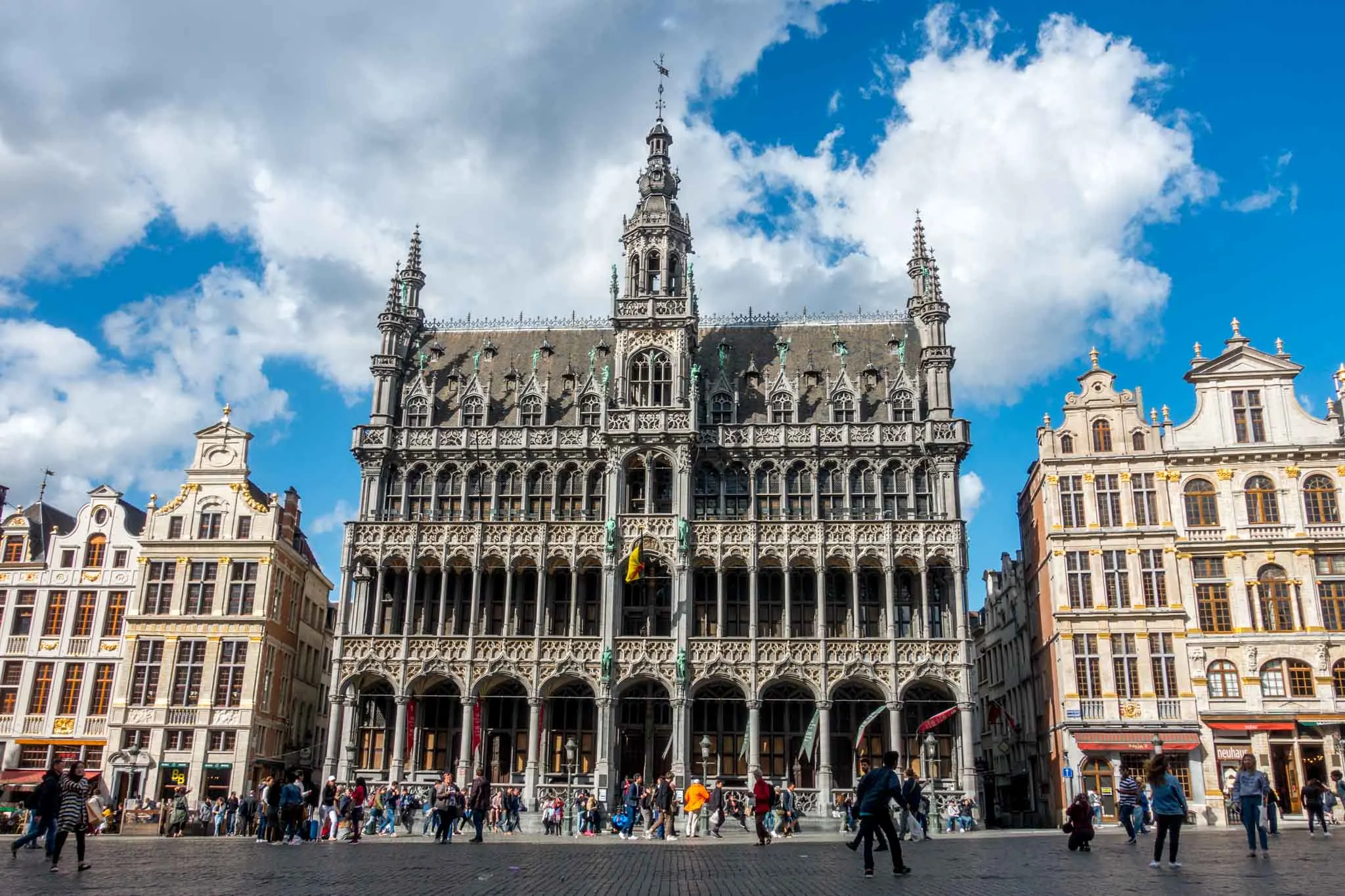 People and buildings in a city square