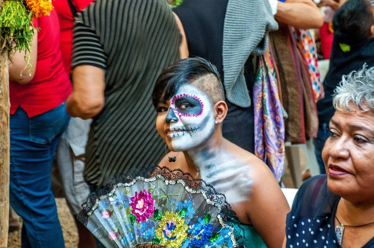 Woman with face paint for Day of the Dead holiday