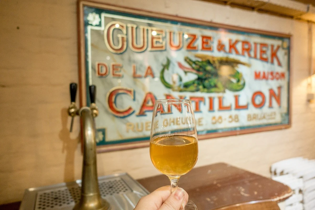 Glass of gueuze lambic at Cantillon Brewery