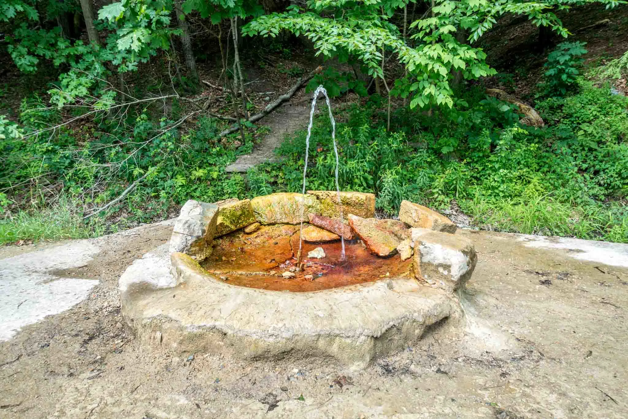 Polaris spring, a natural mineral spring shooting up from the ground.