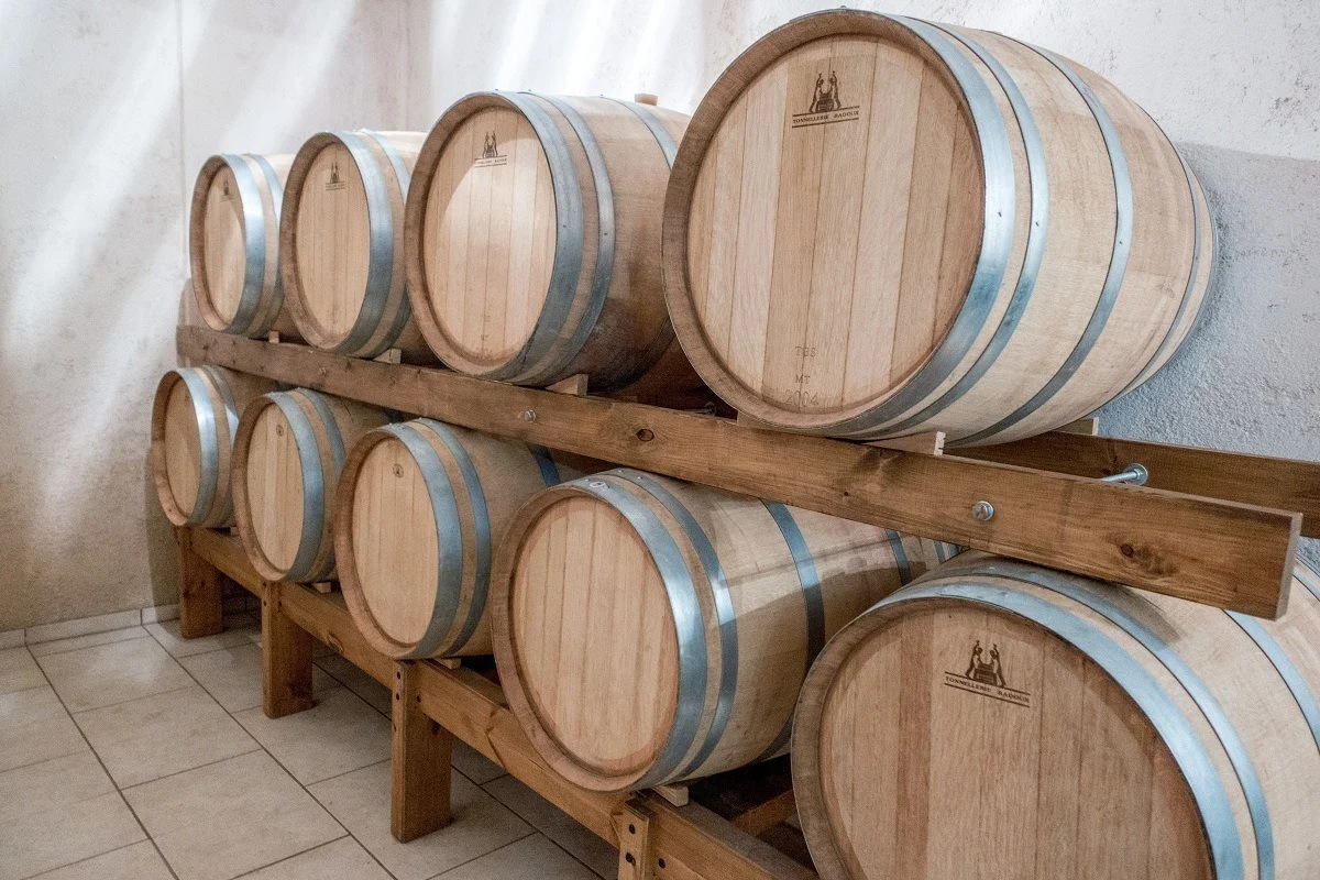 Wine aging in barrels at Stilianou winery in Crete