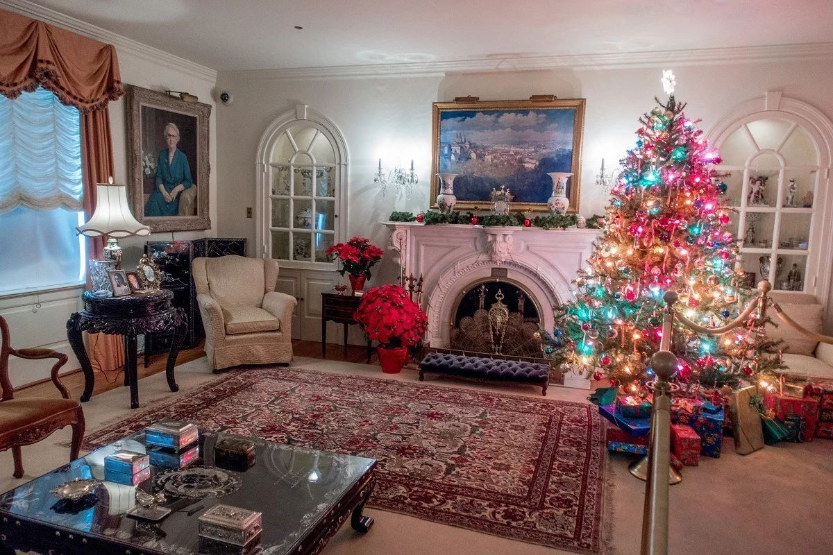 Christmas tree and presents in the living room of an historic home