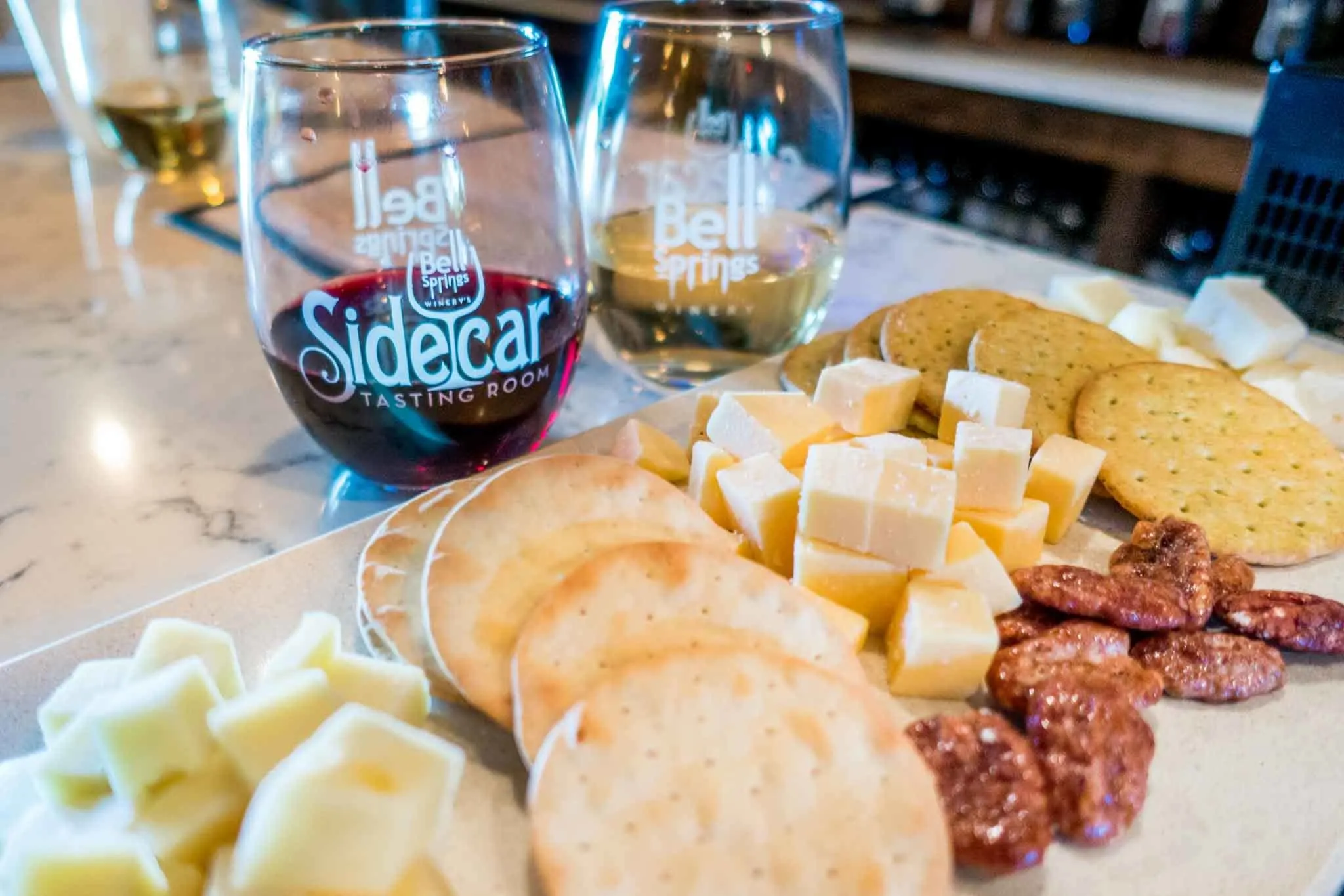 Wine glasses and snacks. 