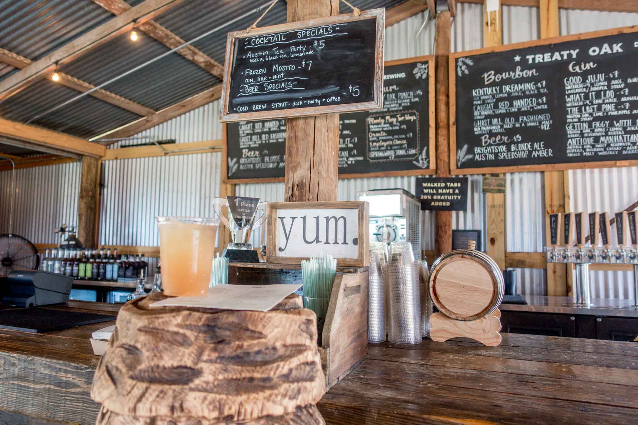 Drink and menu on a bar