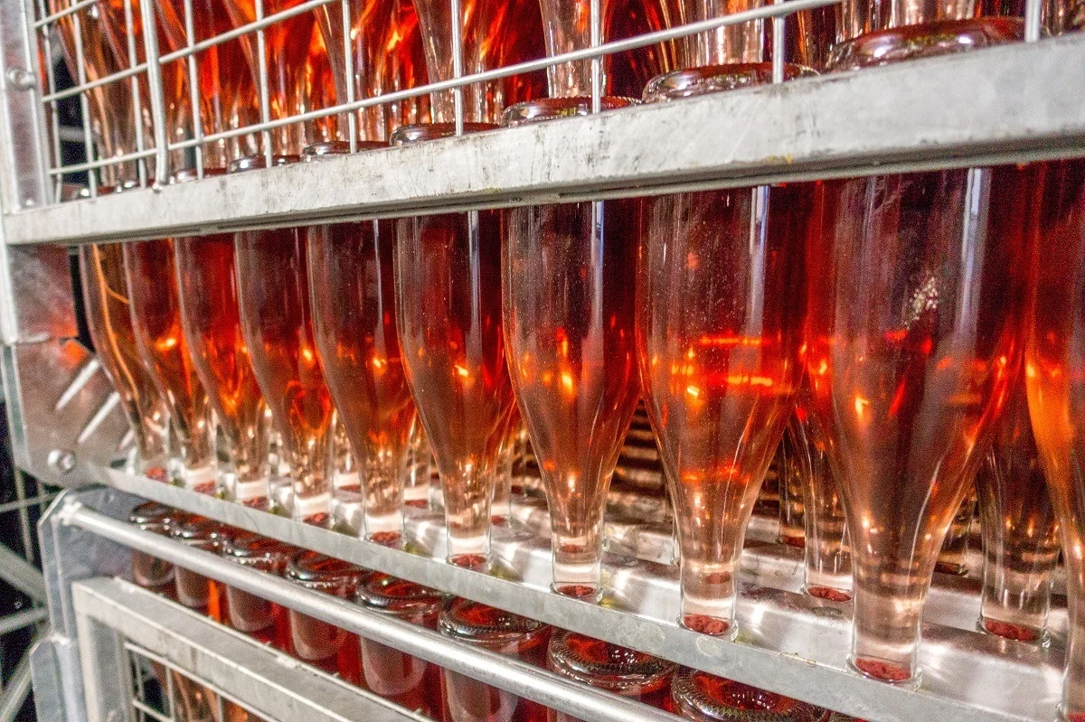 Upside-down bottles of rose wine