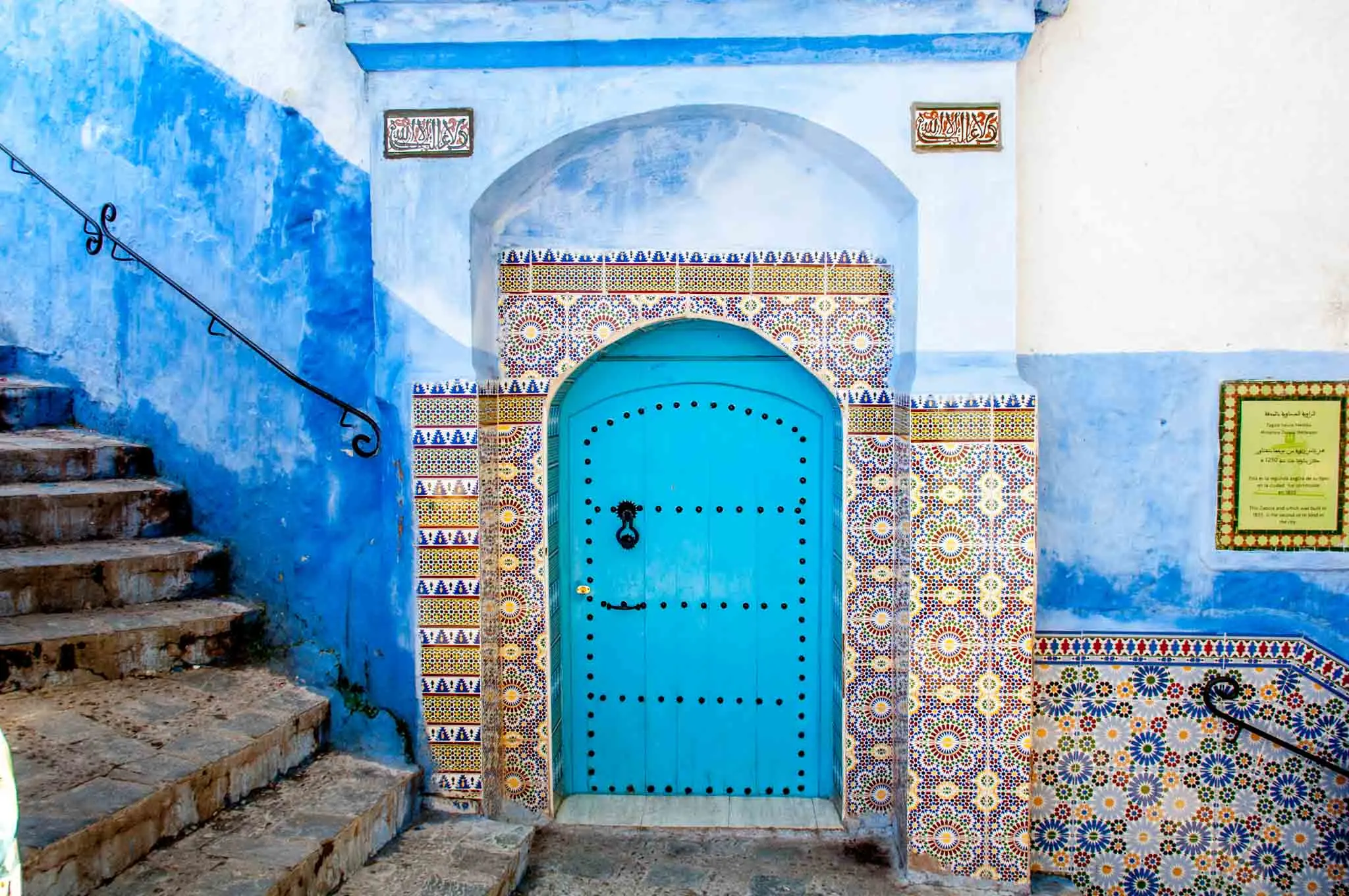 Blue door and tilework in Chefchaouen, Morocco