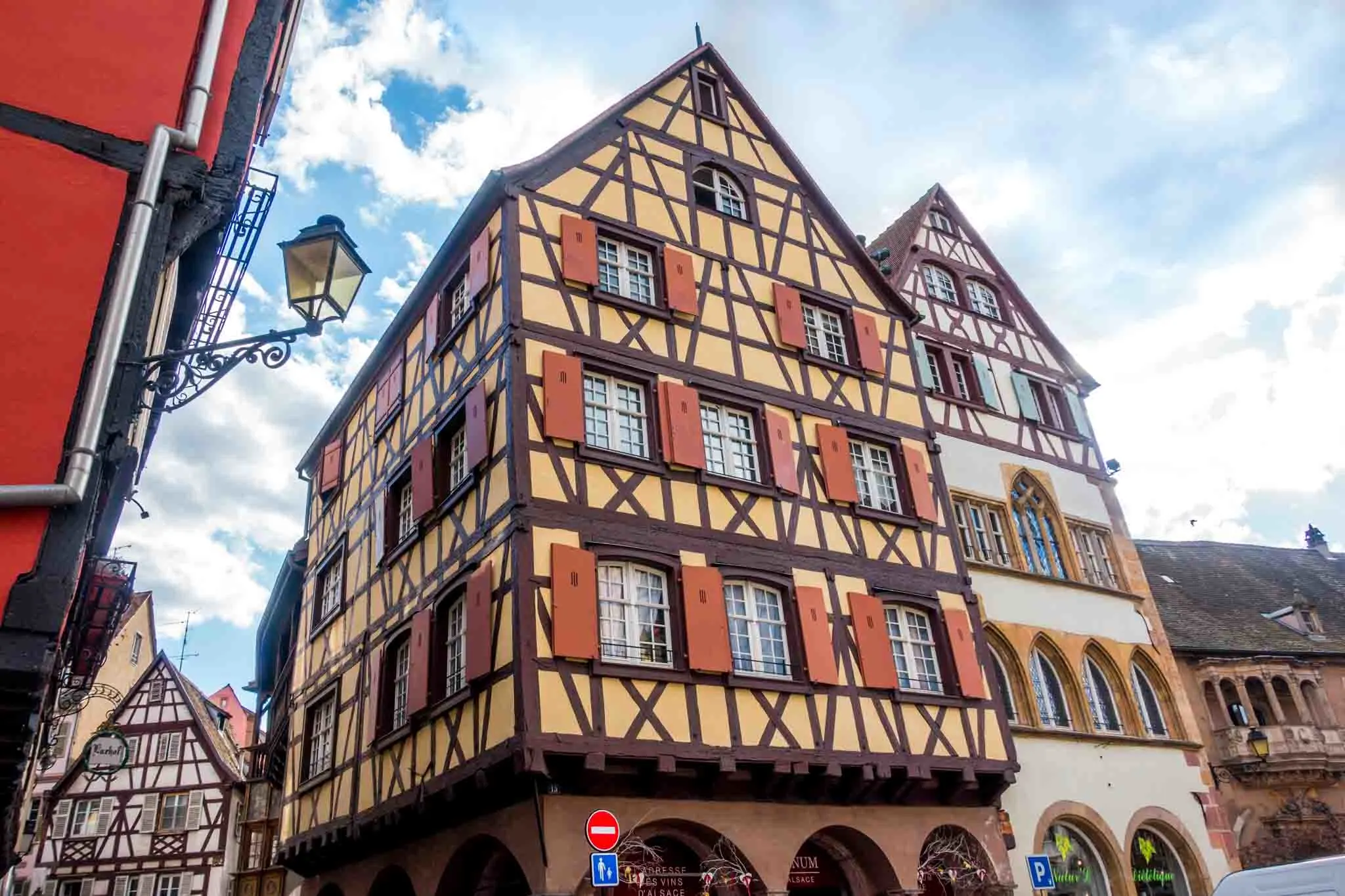 Yellow, half-timbered building.