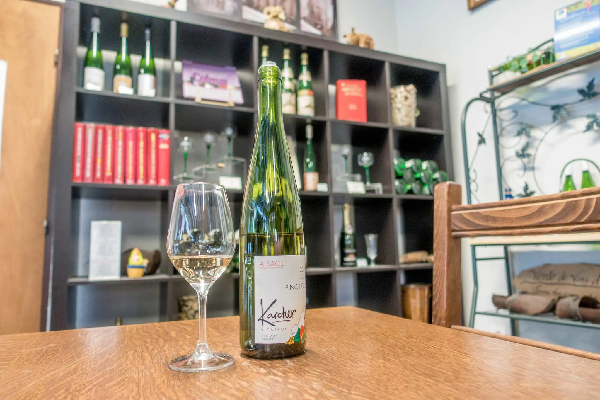 Wine bottle and glass at Domaine Karcher in Alsace France