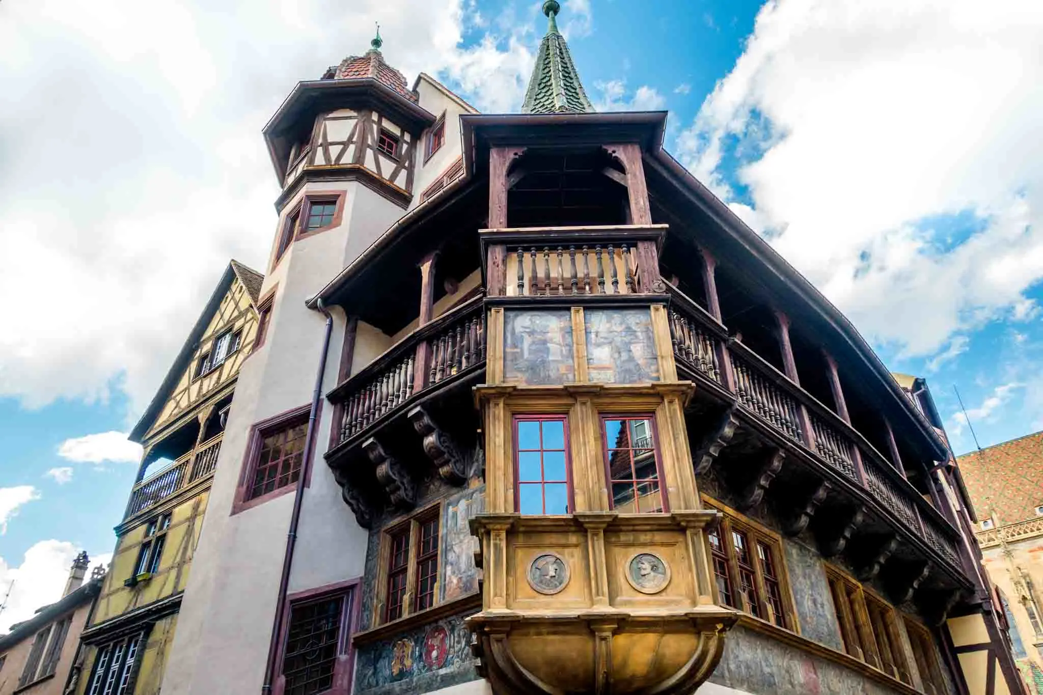 House with painted wooden balcony, Pfister House