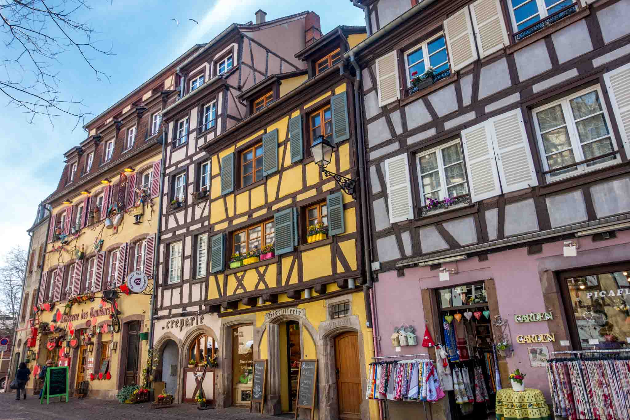 Half-timbered buildings housing shops and restaurants.